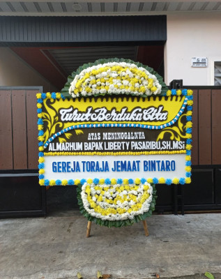 Papan Bunga Duka di Gido